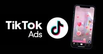 Tela de smartphone exibindo a plataforma TikTok Ads, destacando estratégias de anúncios TikTok Ads para engajar o público e aumentar a visibilidade de marcas.